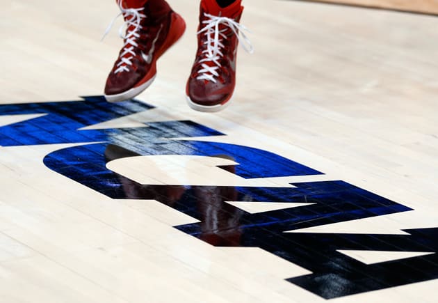ncaa-logo-basketball-player.jpg